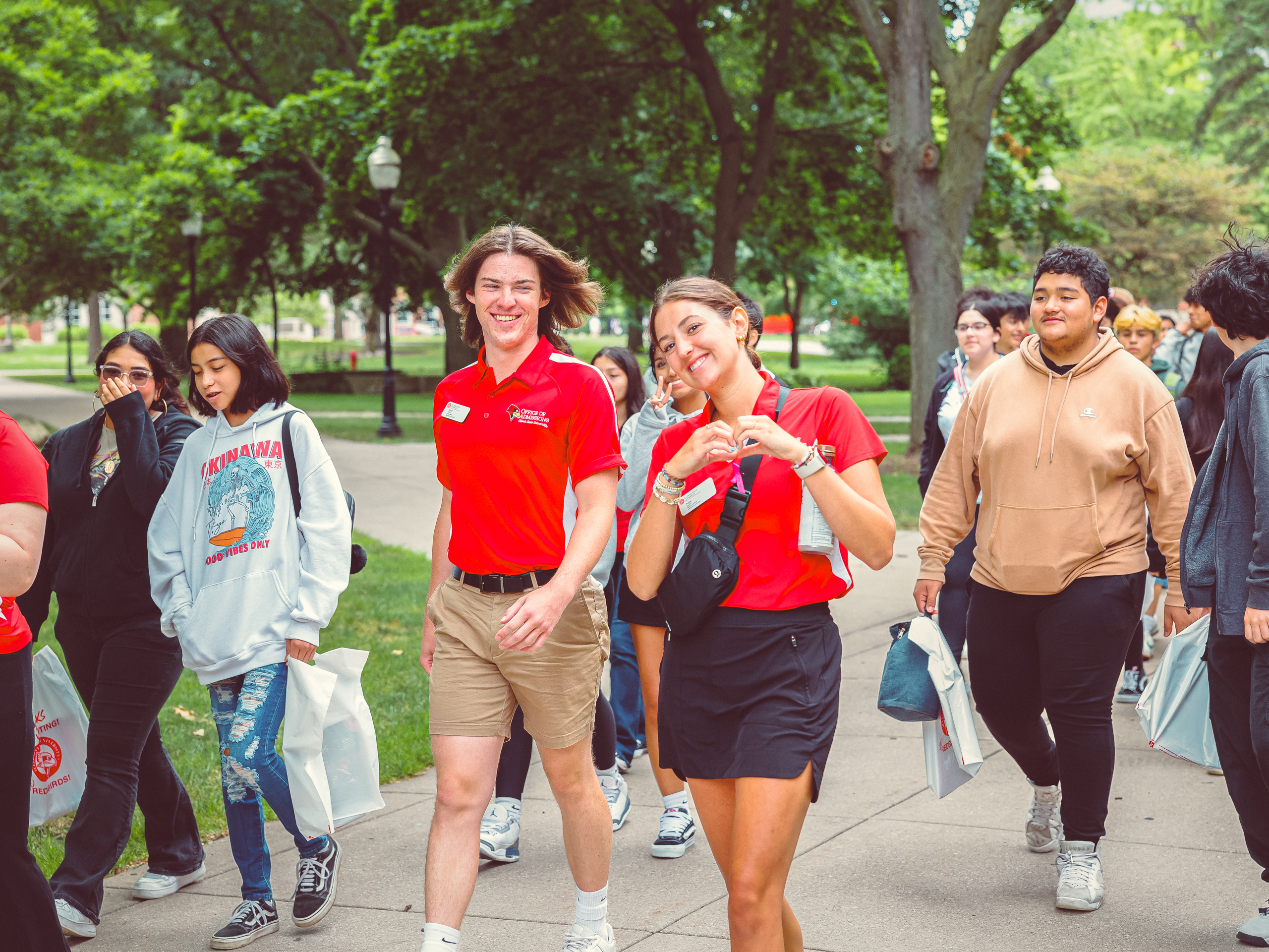 Tour guides leading tours on campus.